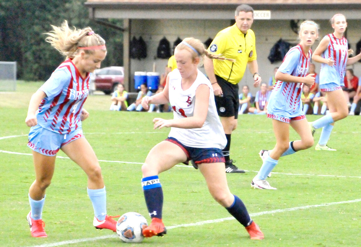 Lady Patriot Nanney attacks the ball